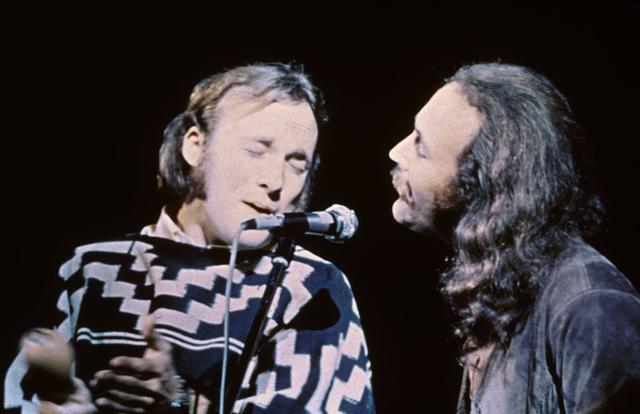 American musicians Stephen Stills (left) and David Crosby of the group Crosby, Stills, & Nash performs on stage at the Woodstock Music and Art Festival, Bethel, New York, August 17, 1969. (Photo by Fotos International/Getty Images)