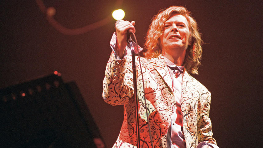 David Bowie seen here performing on the pyramid stage at Glastonbury. 25th June 2000. (Photo by Staff Western Gazette/Mirrorpix/Getty Images)