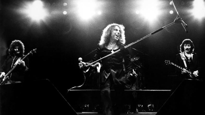 UNITED KINGDOM - JUNE 25: Photo of BLACK SABBATH and Ronnie DIO; L-R: Geezer Butler, Ronnie Dio, Tony Iommi performing live onstage at Gaumont (Photo by Fin Costello/Redferns)